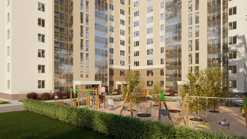 Цветовая гамма — естественная и спокойная, при этом фасад эффектно играет в лучах солнца